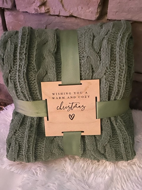 Blanket with engraved tag